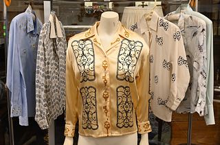 Six Escada Shirts and Blouses, to include one in blue cotton with embroidered daisies, along with silk prints, size S/M, condition consistent with nor
