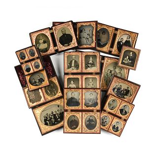A GROUP OF TWENTY-EIGHT AMERICAN DAGUERREOTYPE, AMBROTYPE, AND TINTYPE PHOTOGRAPHS OF FAMILIES, MID 19TH CENTURY, 1855-1875,