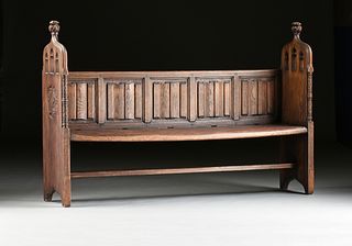 AN ENGLISH GOTHIC REVIVAL CARVED OAK PEW, 1840s,