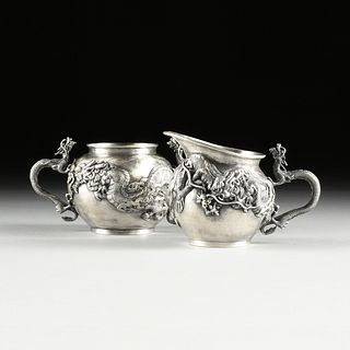 A TWO PIECE JAPANESE REPOUSSÉ SILVER SUGAR BOWL AND CREAM PITCHER SET, STAMPED, LATE 19TH/EARLY 20TH CENTURY,