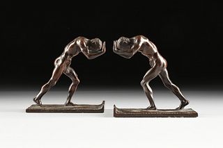 ISIDORE KONTI (Austrian/American 1862-1938) PAIR OF BRONZE BOOKENDS, "Pushing Men," BY GORHAM FOUNDRIES, SIGNED, CIRCA 1911,