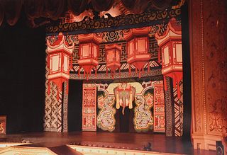 AN ENORMOUS CIRCUS MAGICIAN'S PAINTED "LANTERN ARCH" STAGE BACKDROP, SECOND-HALF 20TH CENTURY, 