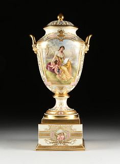 A ROYAL VIENNA STYLE PARCEL GILT AND HAND PAINTED PORCELAIN LIDDED URN, "MARCHEN," MARKED, LATE 19TH/EARLY 20TH CENTURY,