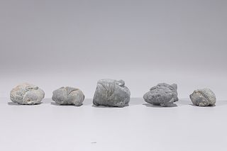 Group of Five Carved Gandharan Schist Heads