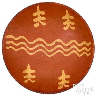 Pennsylvania redware pie plate, 19th c.
