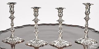 Two pairs of Georgian style silver candlesticks