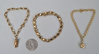Two 14K Gold Charm Bracelets