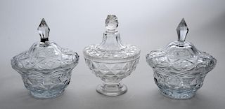PAIR OF ANGLO-IRISH FOOTED SWEET MEAT BOWLS AND COVERS AND A FOOTED BOWL AND COVER, AND A FRUIT BOWL