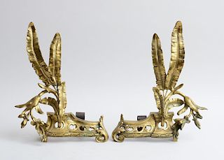 PAIR OF CONTINENTAL ROCOCO STYLE GILT-METAL CHENETS