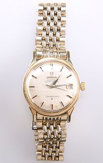 AN OMEGA CONSTELLATION BRACELET WATCH,?circular silver dial with black and 