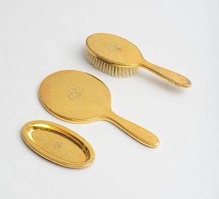 TIFFANY & CO. MONOGRAMMED AND INCISED 14K GOLD FIVE-PIECE DRESSING TABLE SET AND THREE MATCHING TIFFANY & CO. SILVER-GILT DRESSING TABLE PIECES