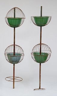 GROUP OF THREE METAL AND PLASTIC TWO-TIERED TOPIARY FIXTURES