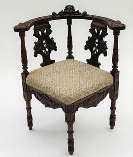 19C Ornately Carved Corner Chair