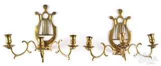 Four late George III lyre-back sconces