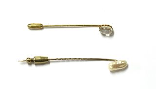 Two gold stick pins,