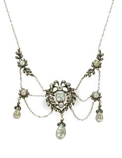 An early 20th century silver paste and marcasite set swag necklace,