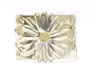 A silver daisy torque cuff bangle, by Tiffany & Co.,