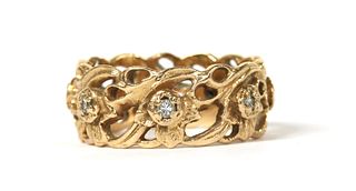 A 14ct gold diamond set 'The Welsh Gold Full Eternity Ring', designed by Stuart Devlin,