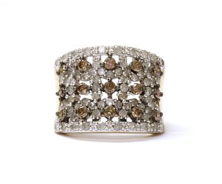 A 9ct gold diamond and brown diamond ring,