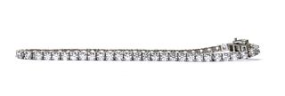 A silver cubic zirconia line bracelet,