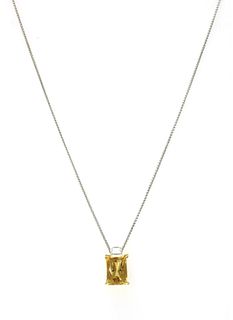 An 18ct gold citine and diamond pendant,