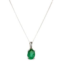 A white gold single stone emerald pendant,
