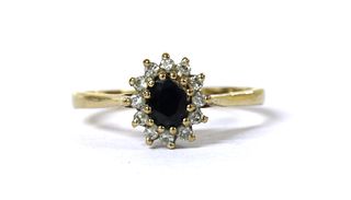 A 9ct gold sapphire and diamond cluster ring,