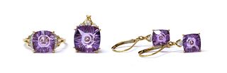 A gold cushion shaped fantasy cut amethyst and diamond ring, pendant and earrings suite,