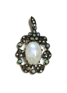 A silver labradorite, opal and diamond wreath pendant,
