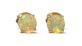 A pair of gold single stone opal stud earrings,