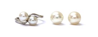 A white gold cultured pearl crossover ring,