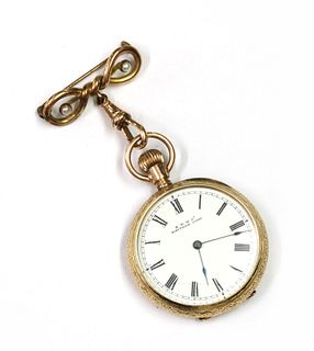 A gold Waltham top wind open-faced fob watch,