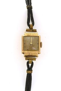 A ladies' Continental gold mechanical strap watch,