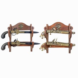 (4) Four Decorative Fire arms with wooden base. Ea