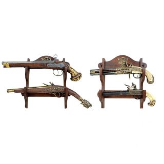 (4) Four Decorative Fire arms with wooden base