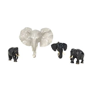 Three Carved Elephant And One Porcelain Lot