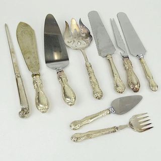 Lot of Nine (9) Sterling Silver Handled Serving Pieces.