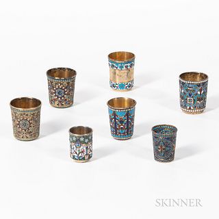 Seven Russian Enamel Cups, Moscow, late 19th to early 20th century, including one plique-Ã -jour and six .875 silver-gilt cups, three be
