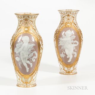 Two Similar KPM Berlin Porcelain PÃ¢te-sur-pÃ¢te Decorated Vases, Germany, c. 1893, each white ground with raised gold scrollwork surroun