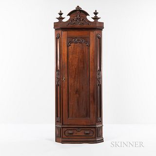 Renaissance Revival Walnut Corner Armoire, 19th century, arched crest with carved foliate detail, single door with floral and foliate c