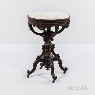 Renaissance Revival Round Walnut Marble-top Table, 19th century, white marble with gray striations, elaborately carved base with scroll