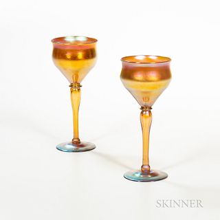 Pair of Tiffany-style Gold Iridescent Goblets, 20th century, both with incised mark "T.L.C.," one with Tiffany paper label, ht. 8 3/4 i