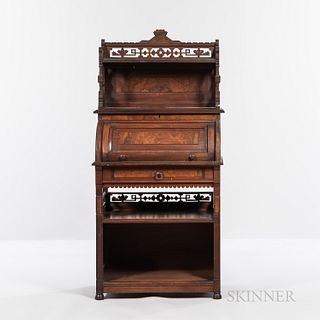 Eastlake-style Walnut Roll-top Desk, c. 1900, top carved with floral elements, two shelves above, drawer and two shelves below, plaque