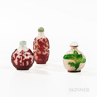 Three Overlay 'Snowflake' Glass Snuff Bottles, China, 19th to 20th century, all flattened flask-form, one circular decorated with a pro