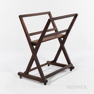 Mahogany Print Rack, on casters, folds inwards on brass hinge at one side, ht. 37 1/2, lg. 30 1/2, wd. 23 in. Provenance: Townshend Col