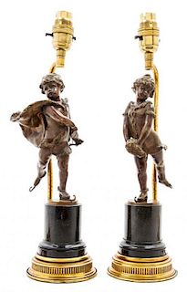 A Pair of Cast Metal Figural Table Lamps Height 14 7/8 inches.