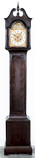A German Mahogany Tall Case Grandmother Clock Height 72 inches.