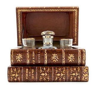A Leather-Bound Book Form Decanter Set Width 7 inches.