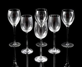 A Group of Glass Wine Stems Height of tallest 10 inches.