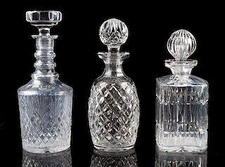 Three Glass Decanters Height of tallest 11 inches.